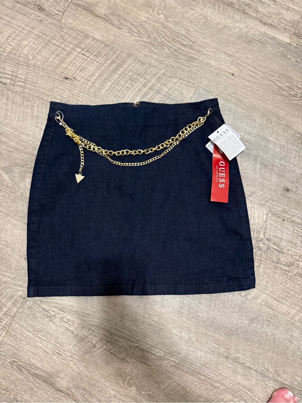 GUESS Navy Denim Mini Skirt with Gold Chain Accent